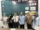 Mahasiswa FEBI UIN Raden Mas Said Surakarta berdiri rapi bersama tim BSI KCP Masaran usai sesi monitoring, mengenakan kemeja formal dengan latar branding bank dan suasana ruang kerja profesional.